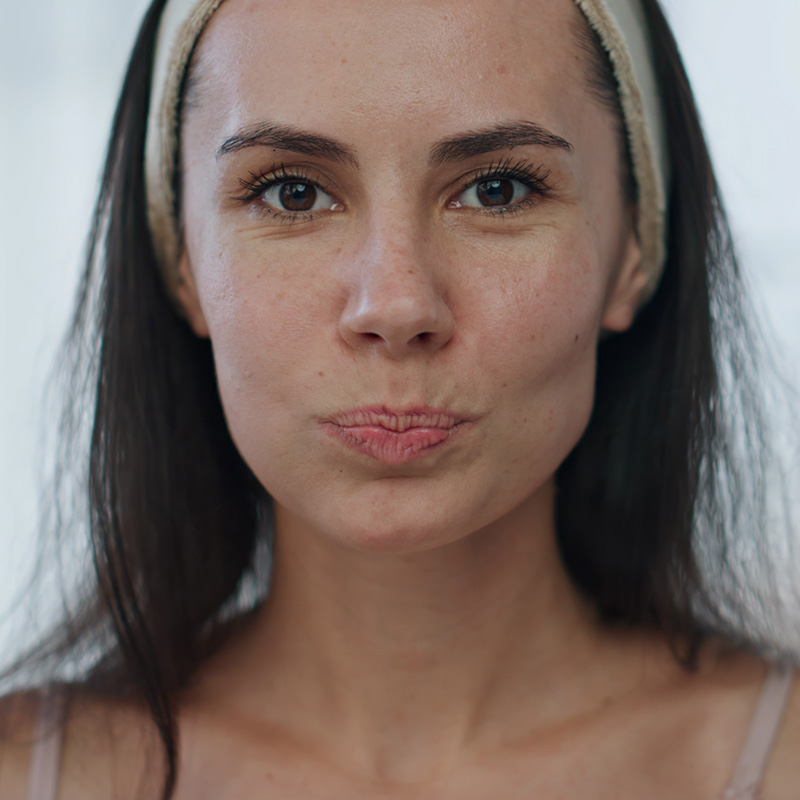 Morning model rinsing mouth smiling at home mirror pov portrait. Lady hygiene